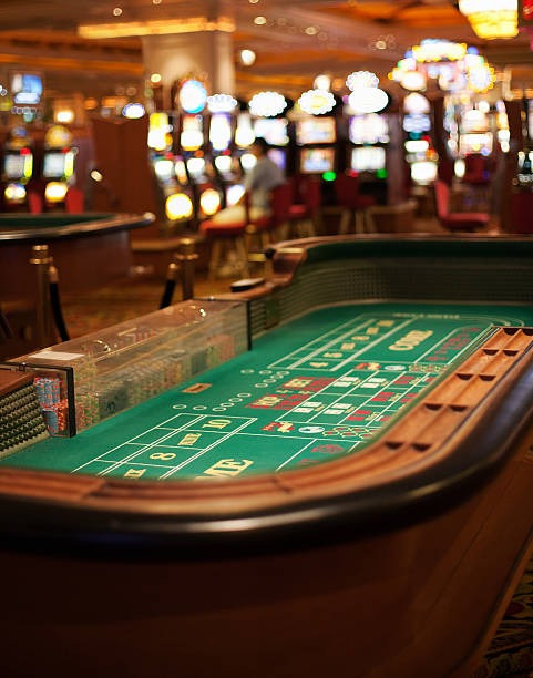 Mobile phone showing fp toto slot game spin screen with bet controls and balance display